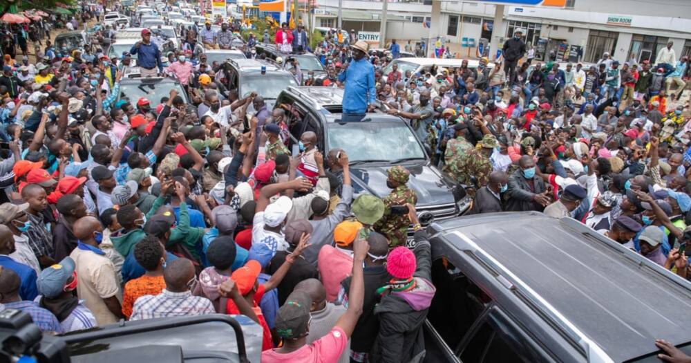 Former prime minister Raila Odinga interacting with people. Photo: Raila Odinga.