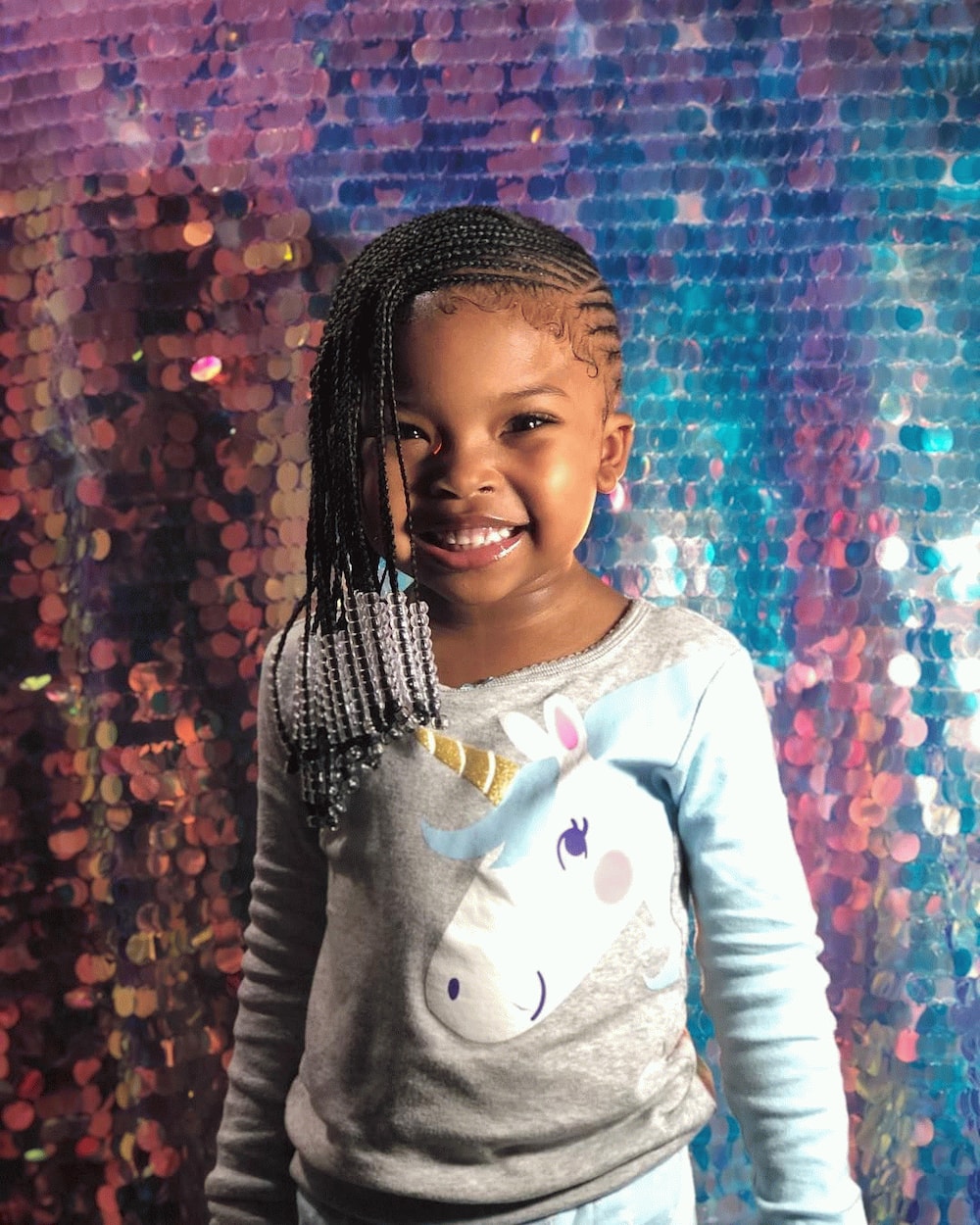 Beautiful African Toddler Girl with Braids and Hair Beads