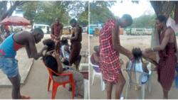 Maasai Men Minting Money from Plaiting Women's hair in Mombasa