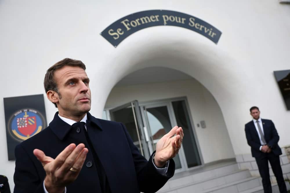 France's President Emmanuel Macron speaks to the media on Friday