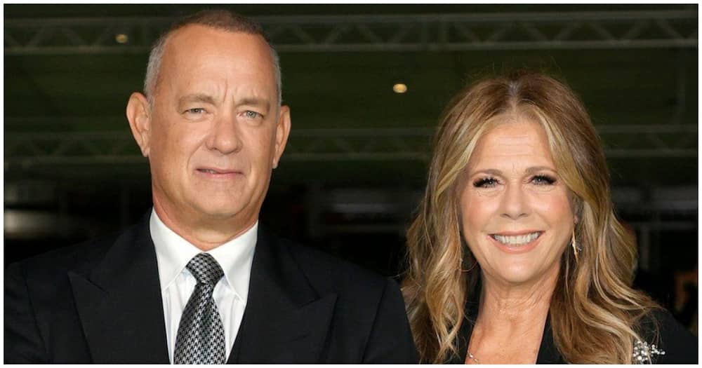 Tom Hanks prevented wife from a rowdy crowd. Photo: Getty Images.