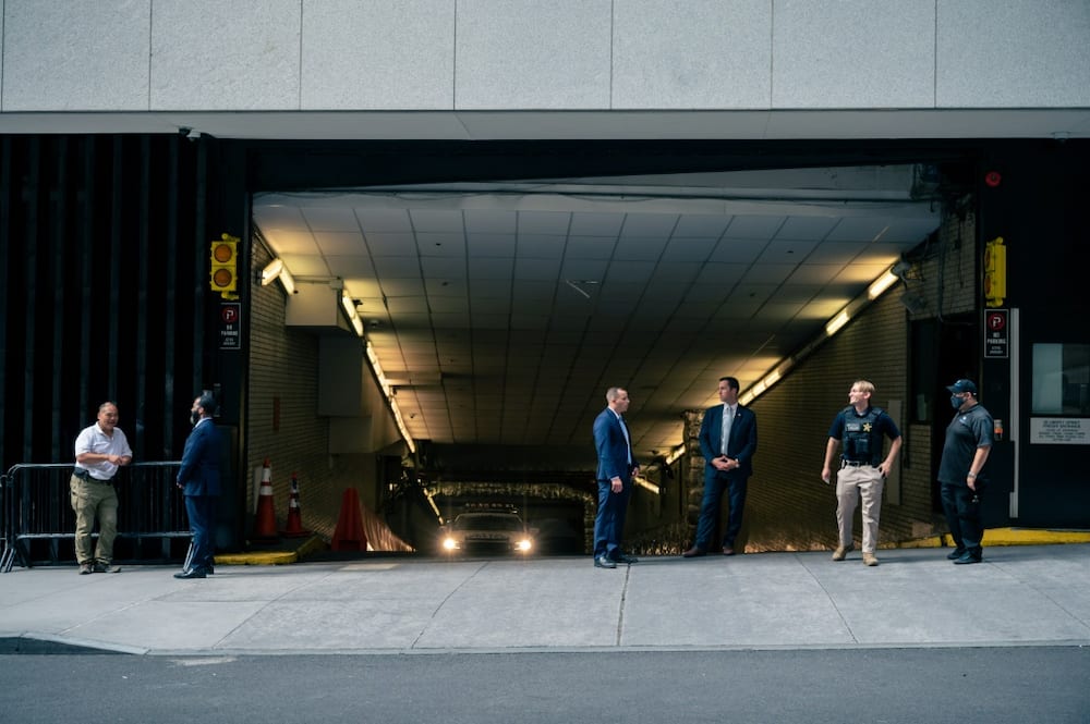 Secret Service agents stand outside of the New York Attorney General's office, where former US President Donald Trump was meeting with New York Attorney General Letitia James, in New York City on August 10, 2022
