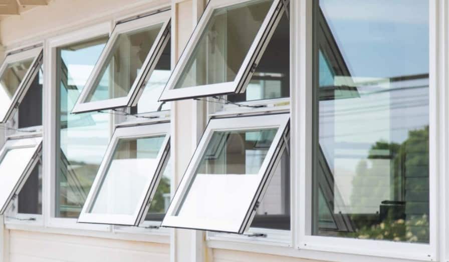White painted steel awning windows