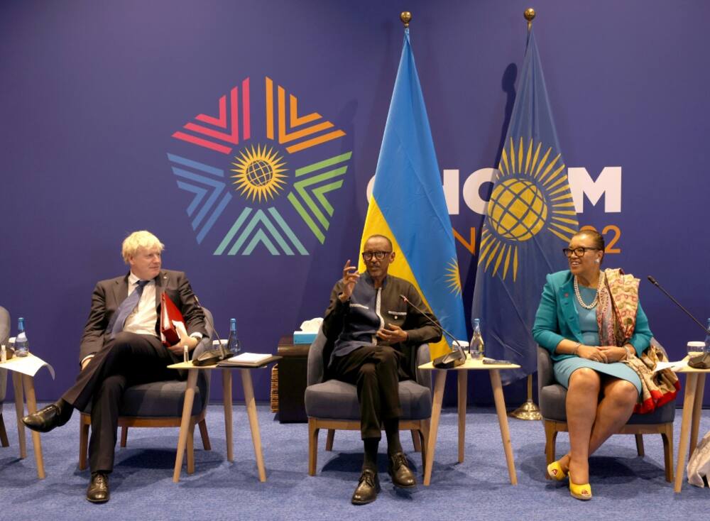 Rwandan President Paul Kagame is pictured with British Prime Minister Boris Johnson and Commonwealth secretary-general Patricia Scotland