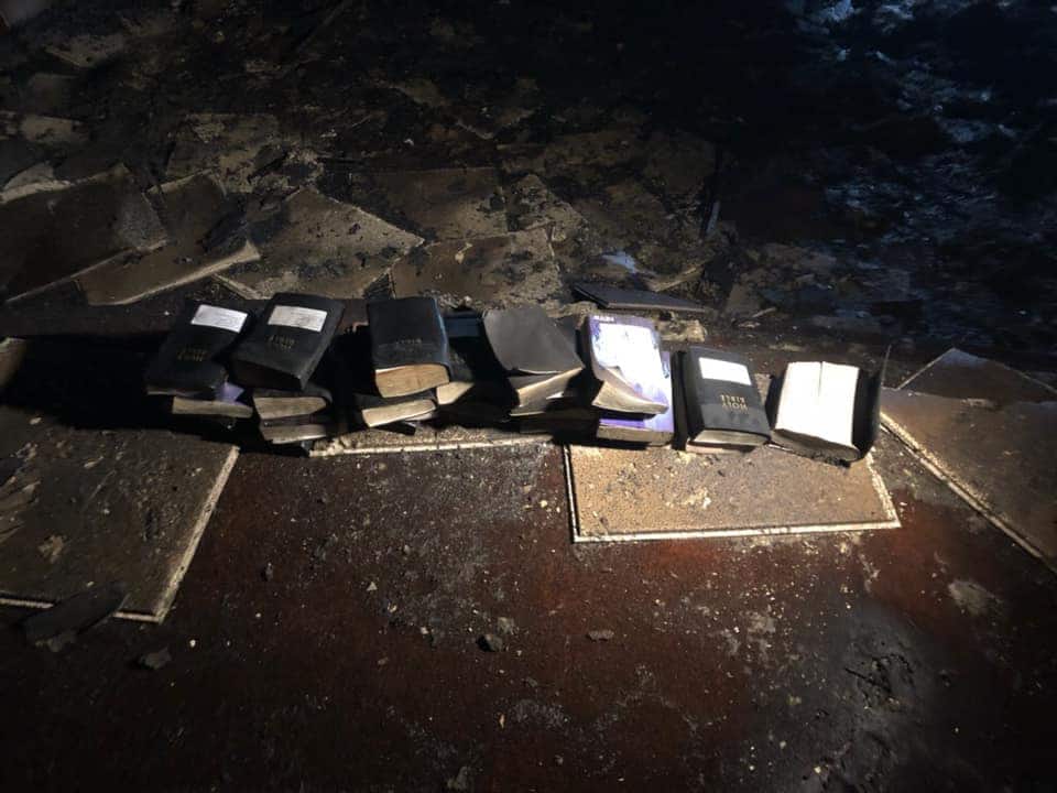 Bibles, cross remain untouched as fire razes down church