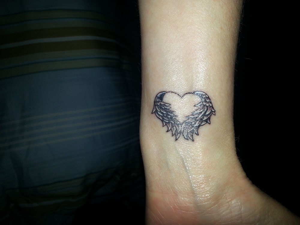 heart with wings tattoos