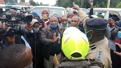CS Matiang'i forced to alight from his vehicle to calm down protesters in Limuru