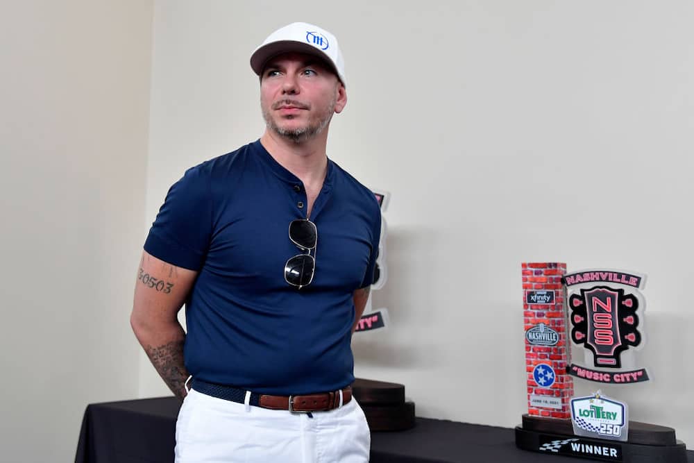 Pitbull waits in the media center at Nashville Superspeedway