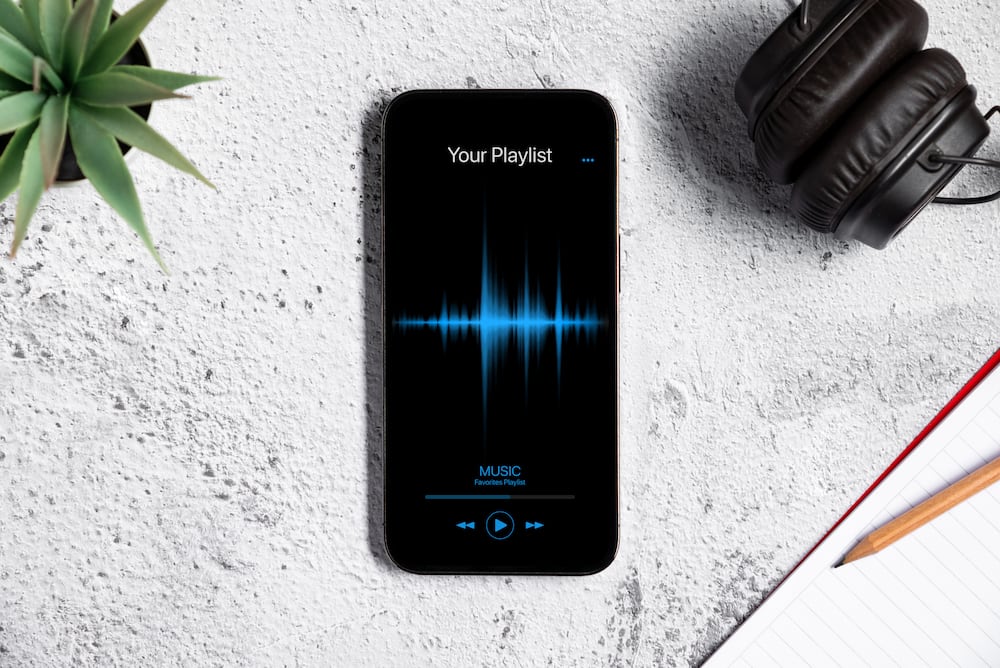 The image of a smartphone with a music player App on.