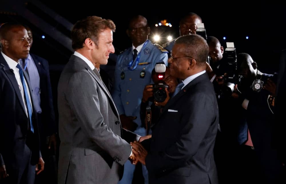 French President Emmanuel Macron is welcomed by Cameroon's Prime Minister Joseph Dion Ngute at the start of his three-nation tour of western Africa