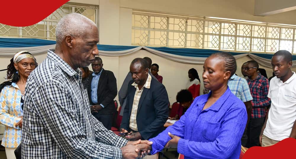 Vice Chancellor Paul Wainaina greets a parent