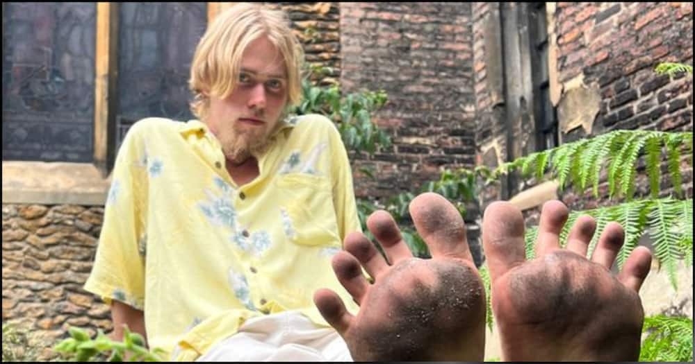 George Woodville hopes to become a millionaire by selling photos of his dirty feet