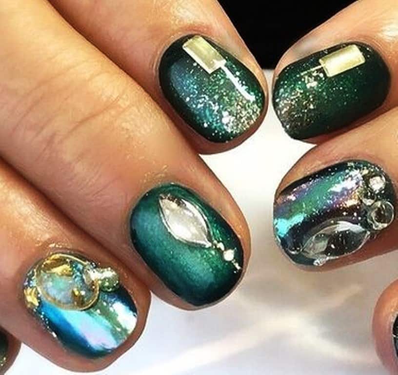 Emerald gem green gradient nail design for St. Patrick's Day