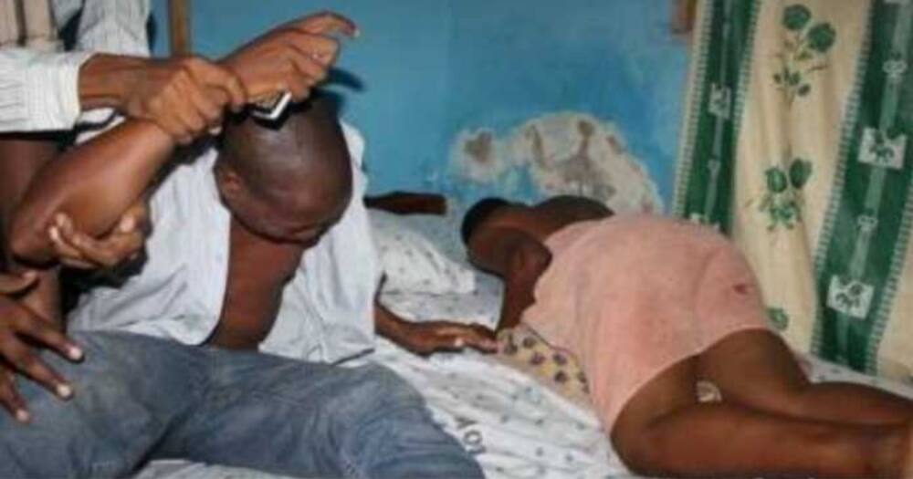 Man and woman caught having an illicit affair. Photo: Doctor Ndumba wa Ndumba.