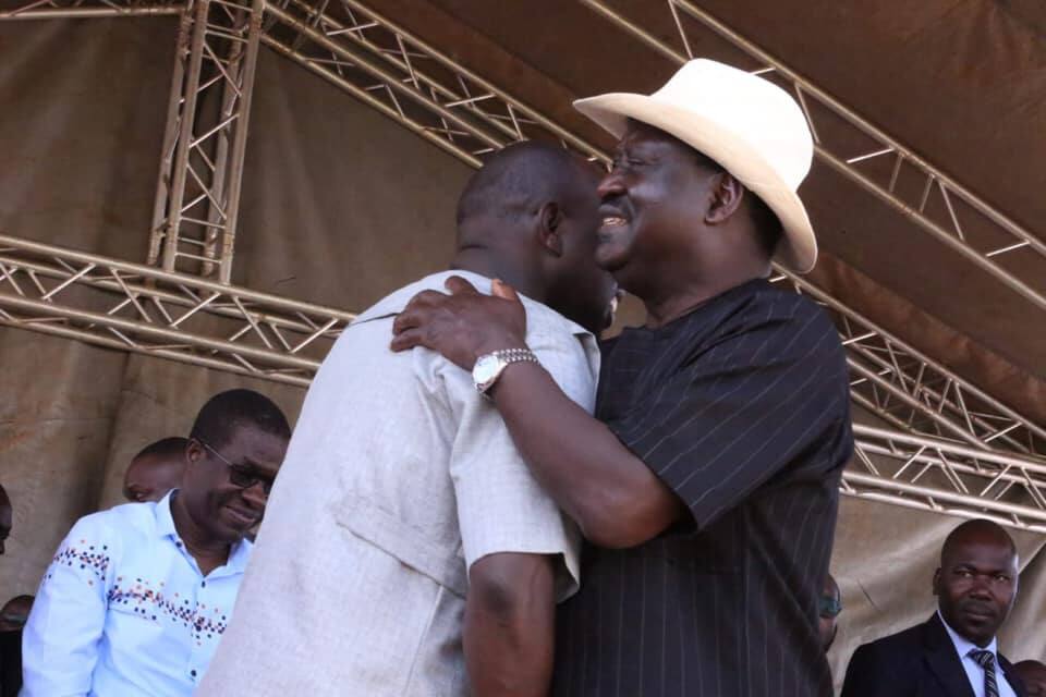 Raila, Murkomen in tight embrace during burial ceremony of Senator Kajwang's mother