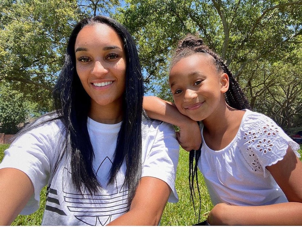 Brianna Johnson hanging out with her daughter Reign.