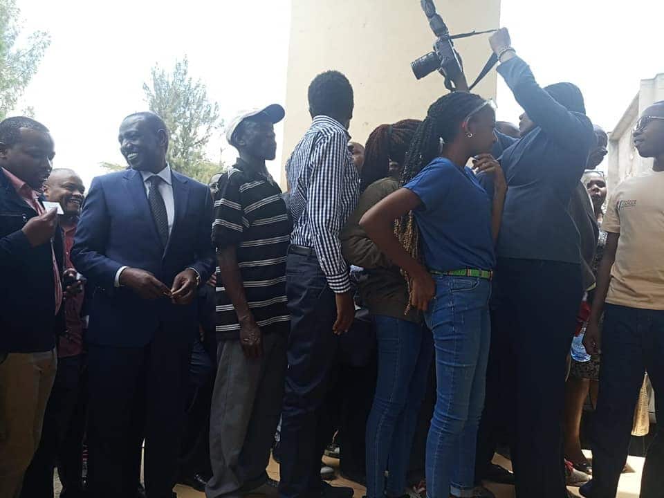 William Ruto silences critics, queues to register for Huduma Namba