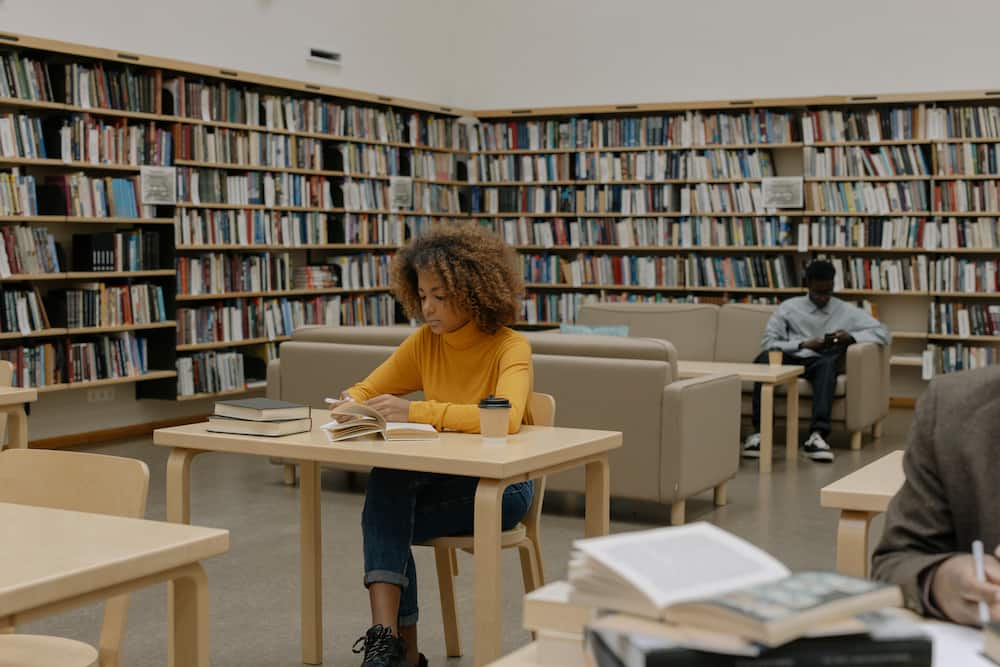 People reading in a library.