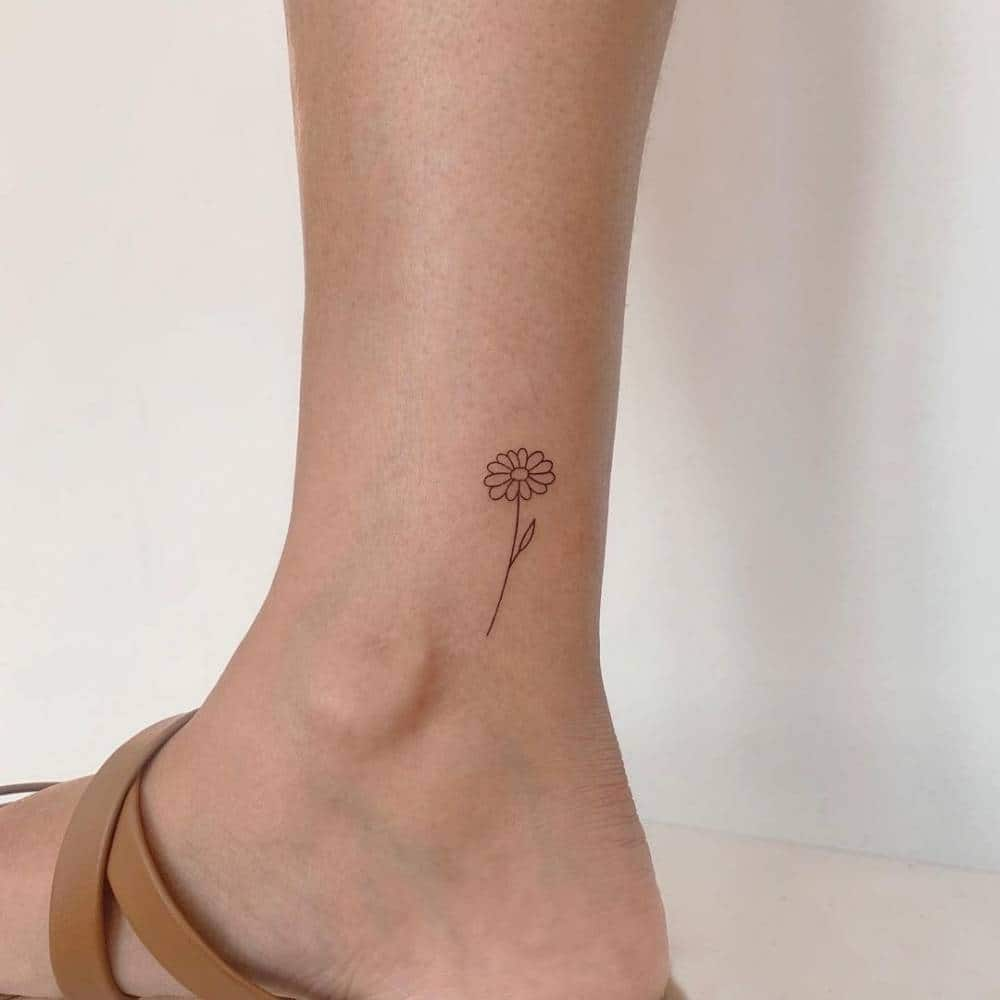 daisy foot tattoos