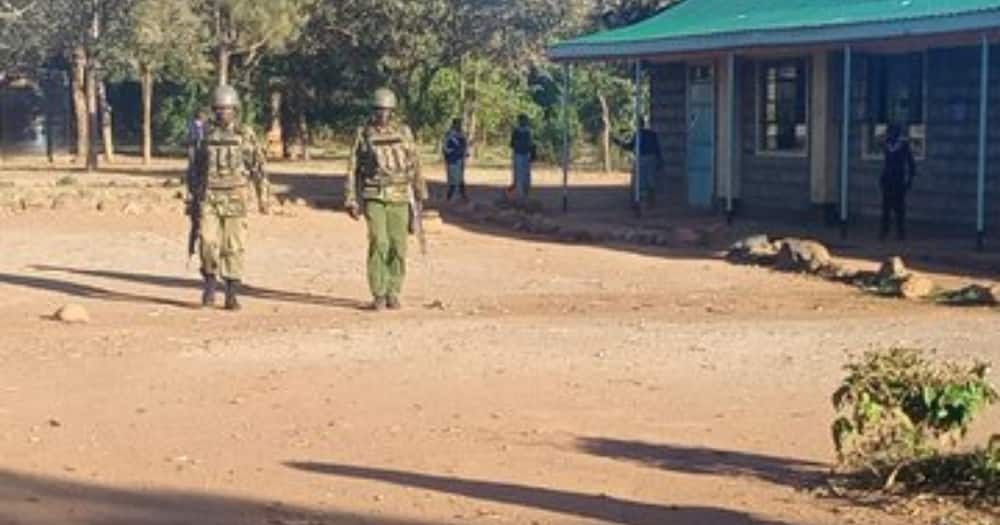 Security officers patrolling a school in the Olmoran area. Photo: National Police Service.