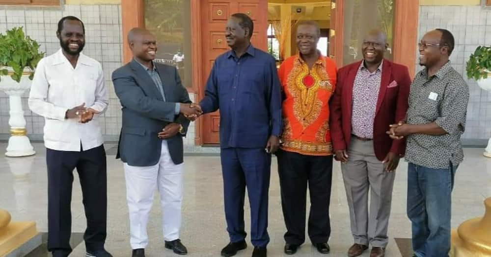 Joash Maangi during a breakfast meeting with Raila Odinga in Kisumu.