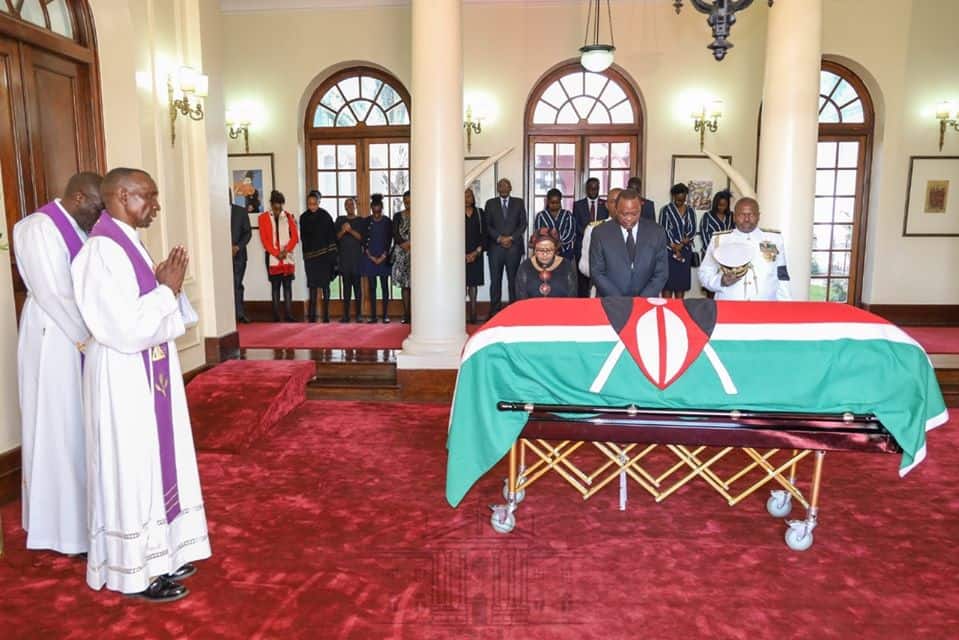 Final salute: Colourful display as military officers escort Moi's body to Nyayo Stadium
