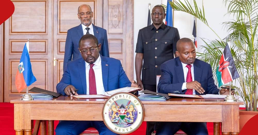 President William Ruto with immediate former Haitian Prime Minister Ariel Henry witnessed an MoU signing in Nairobi earlier in March, 2024.