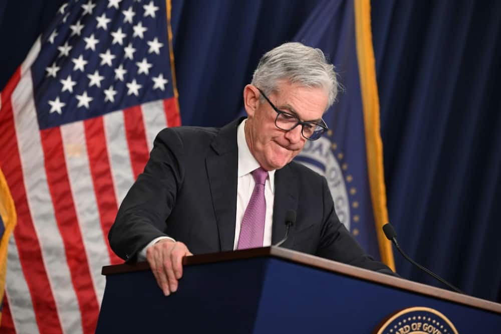 Federal Reserve Chair Jerome Powell said policymakers must continue to act forcefully to tamp down raging price pressures that are squeezing American families.