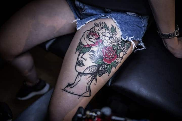 feminine classy thigh tattoos