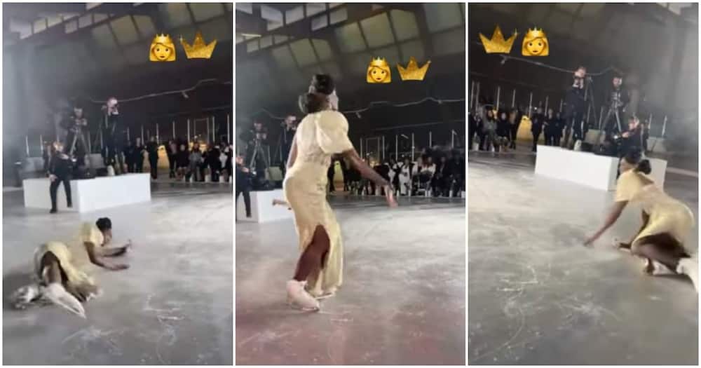 Lady in long dress, fell awkwardly, dancing at event.