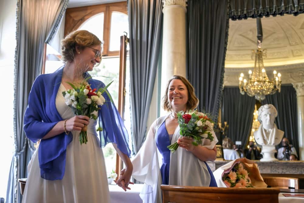 Aline, 46, and Laure, 45, converted their civil union into marriage at the plush Palais Eynard in Geneva