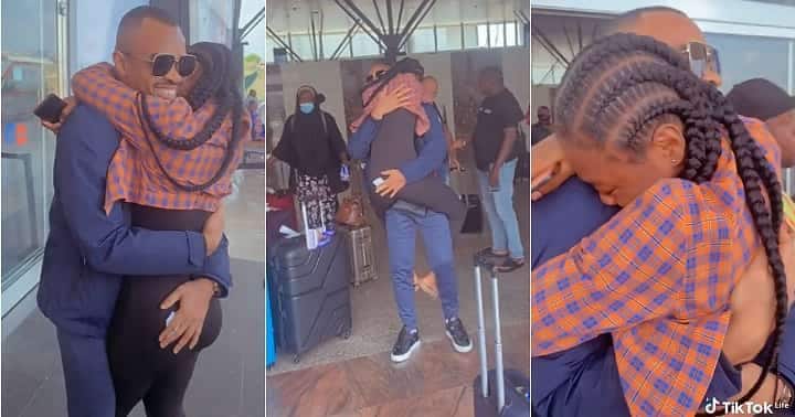 Lady welcomes lover at airport, jumps on him