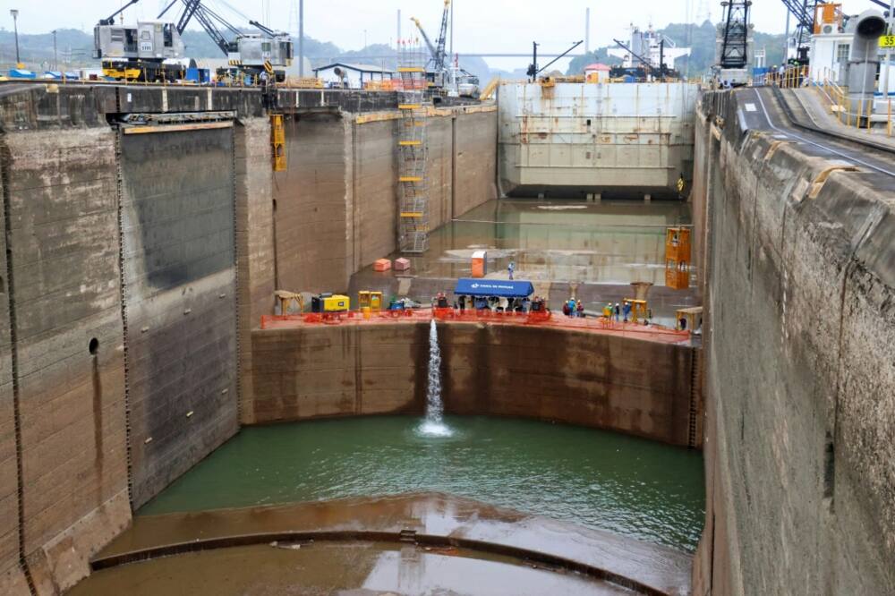 Maintenance work intended to extend the life of the Panama Canal by a century is carried out in a drained lock near the Pacific Ocean, on May 12, 2023
