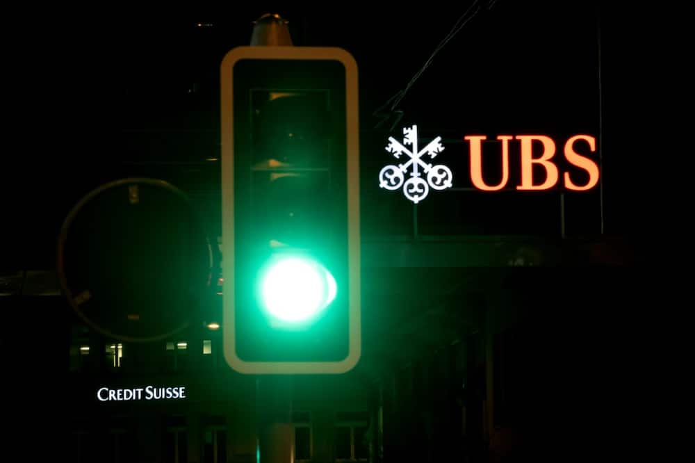 Switzerland's largest bank, UBS, is in talks to take over all or part of Credit Suisse