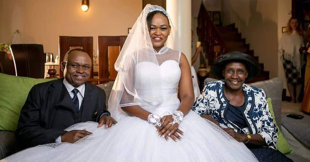 Syombua Osiany and her parents on her wedding day.