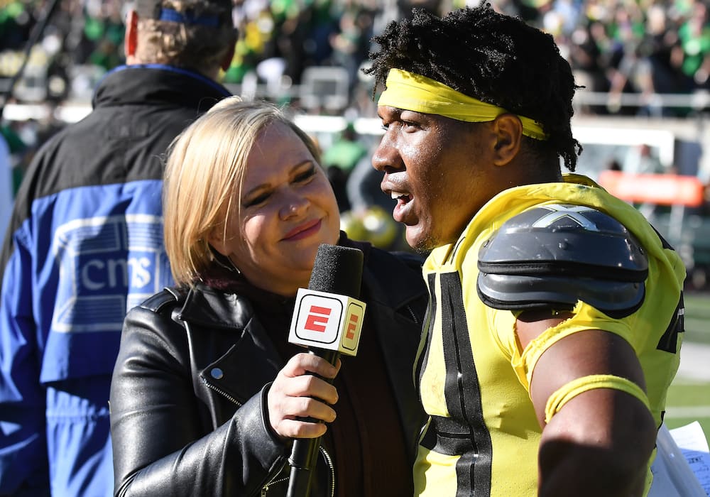 University of Oregon RB CJ Verdell (34) is interviewed after the game by ESPN reporter Shelley Smith