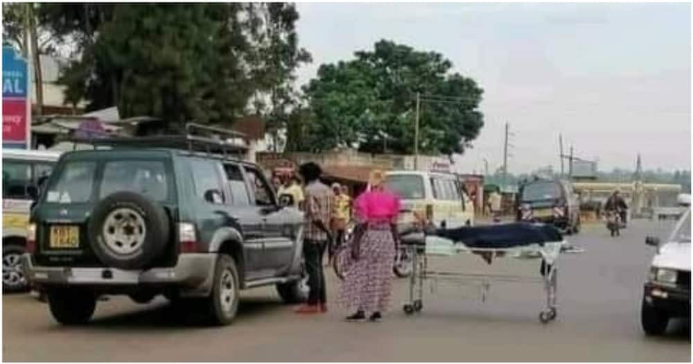 Vihiga Woman Wheels Mother's Body to the Road after Hospital refused Admitting Her to Morgue