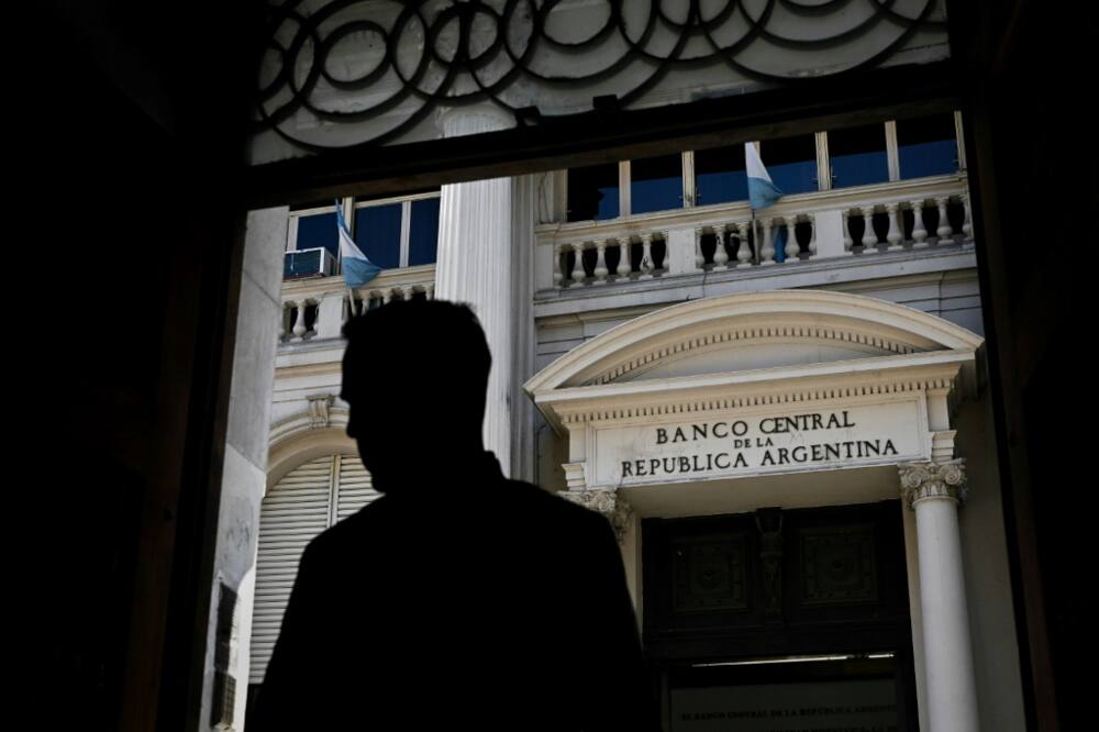 A man stands in front of Argentina's Central Bank in Buenos Aires, May 15, 2023. Year-on-year inflation in the South American country hit almost 109 percent in April