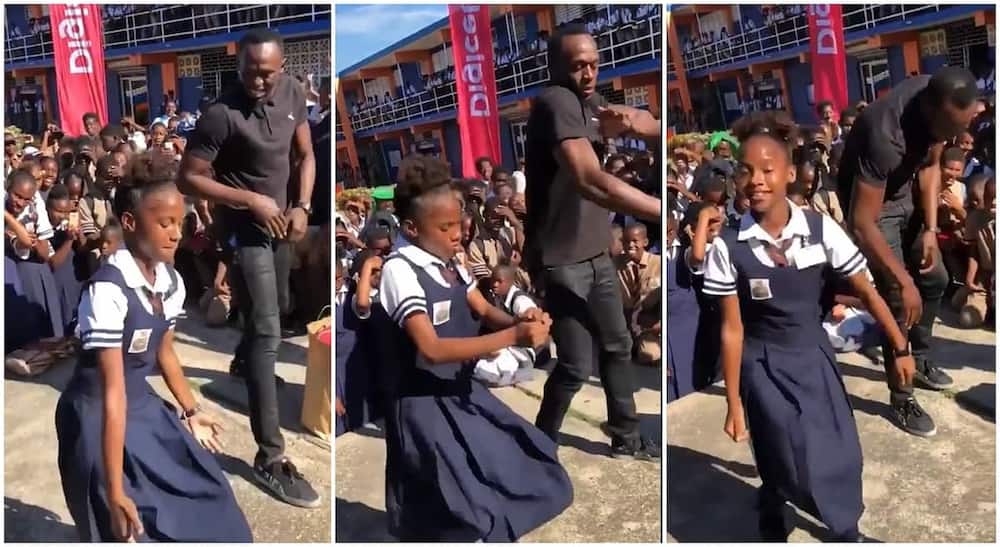 Talented black girl dances with Usain Bolt.