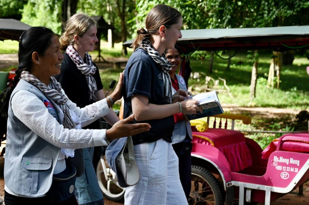 Some female tourists say they feel safe having a female tuk-tuk driver as they visit the sites