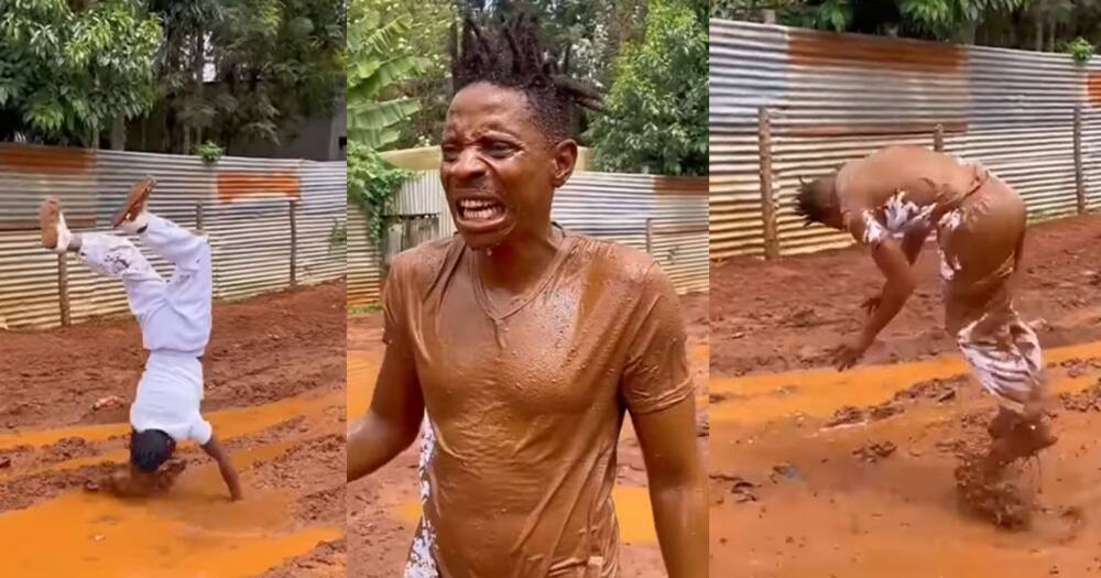 Eric Omondi jumps into a mud puddle.