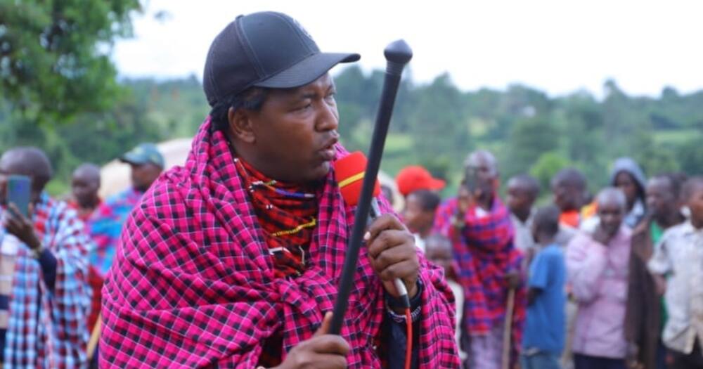 Narok senator Ledama Ole Kina speaks at a public rally.