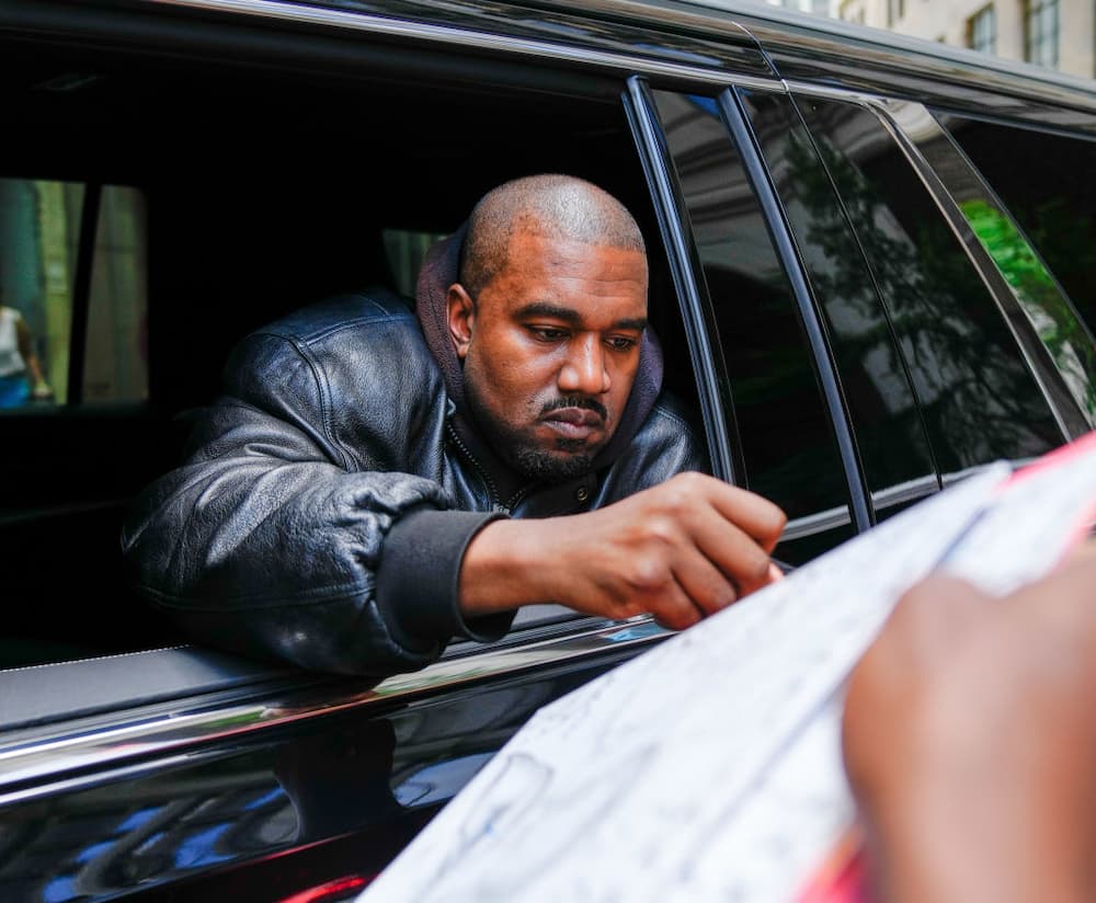 Kanye West arrives at the Balenciaga show in New York City.