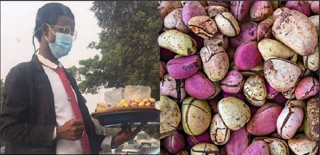 Kola nut seller spotted hawking his wares wearing suits and tie.