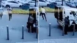 Video of Armed Robber Grabbing Money Box From Cash in Transit Van Officer, Running Away on Foot Shocks Many