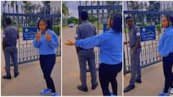 "I'm Crushing on Him": Lady Dances behind Security Man, Pretends after Being Caught in Video