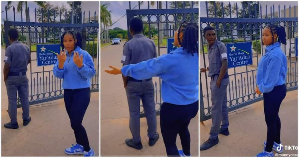 Security man, lady dances behind security man, Shehu Musa Yar'adua Centre, lady crushing on security man