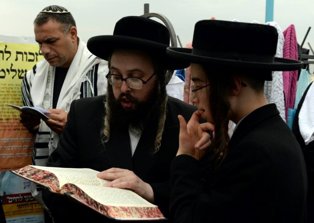 A file picture from September 13, 2015 shows ultra-Orthodox Jews pray in the Ukrainian city of Uman