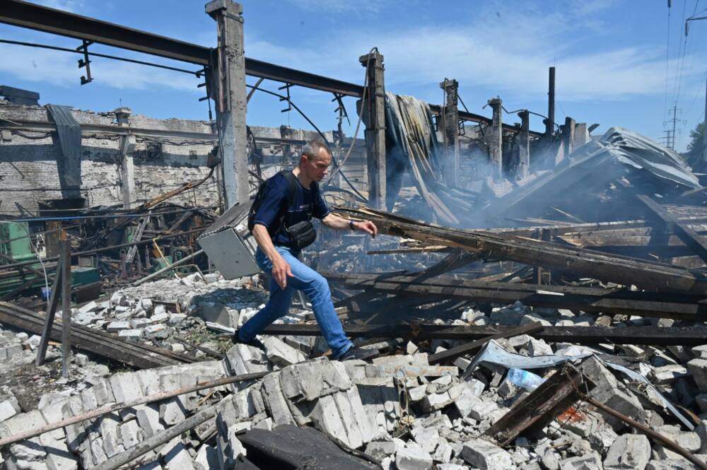 Russian forces have retreated from Snake Island, a Ukrainian outcrop in the Black Sea, but continue to bombard mainland targets like this factory in Kharkiv