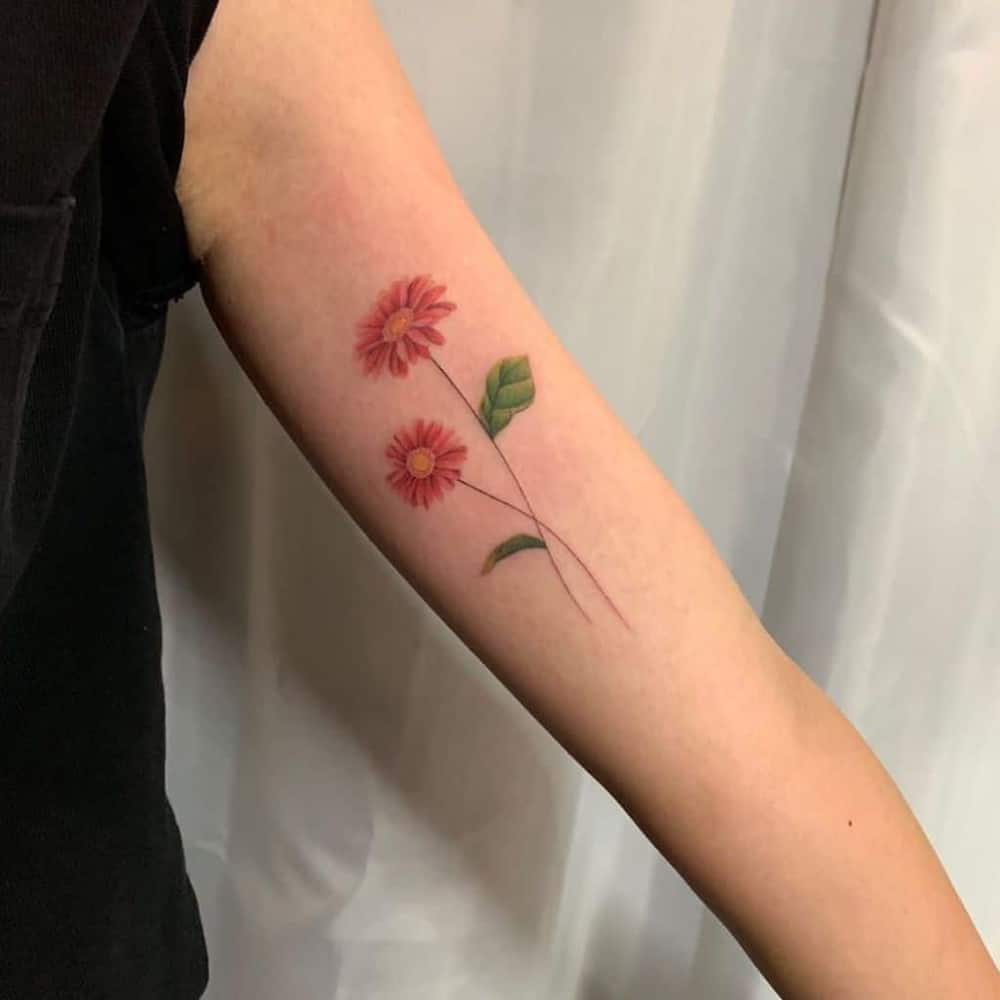 daisy wrist tattoo